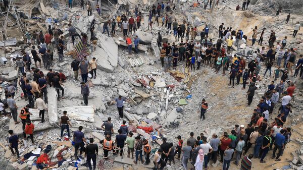 Разрушения от израильской бомбардировки в Хан-Юнисе на юге сектора Газа - اسپوتنیک افغانستان  