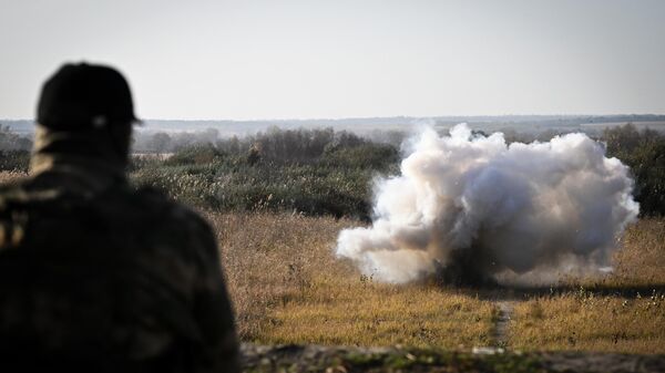 Подрыв боеприпаса, сбрасываемого с БПЛА, в школе аэроразведки Ахмат - اسپوتنیک افغانستان  