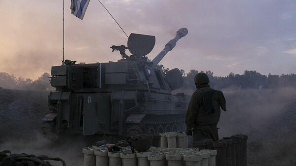 Израильский военный во время наземной операции в секторе Газа. Архивное фото - اسپوتنیک افغانستان  