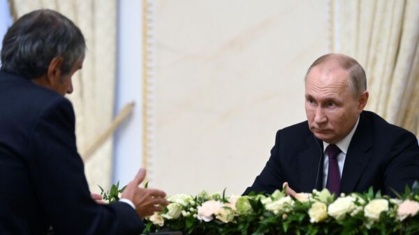 Президент РФ Владимир Путин и генеральный директор МАГАТЭ Рафаэль Гросси во время встречи - اسپوتنیک افغانستان  