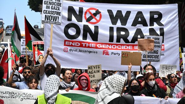 Акция протеста Удар по Газе, призывающая к прекращению огня в конфликте между Израилем и ХАМАС, в Лос-Анджелесе, Калифорния - اسپوتنیک افغانستان  