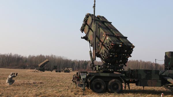 U.S. troops from 5th Battalion of the 7th Air Defense Regiment are seen at a test range in Sochaczew, Poland, on Saturday, March 21, 2015, to demonstrate the U.S. Army’s capacity to deploy Patriot systems rapidly within NATO territory. - اسپوتنیک افغانستان  