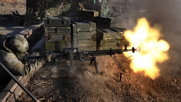 Военнослужащий стреляет из крупнокалиберного пулемета на учениях военнослужащих Тихоокеанского флота (ТОФ) на полигоне в Приморском крае - اسپوتنیک افغانستان  