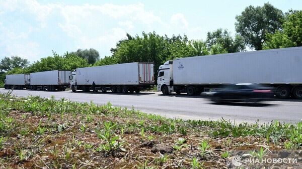 بررسی کامیون‌های یخچال‌دار حاوی اجساد سربازان اوکراینی - اسپوتنیک افغانستان  