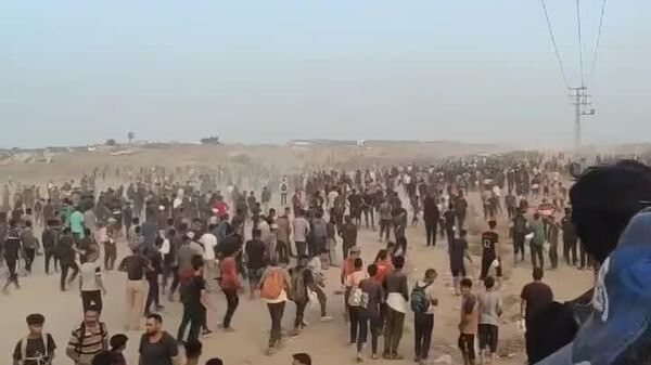 نوار دیداری دردناک از صف‌های طولانی فلسطینیان برای دریافت کمک‌های بشردوستانه در خان‌یونس - اسپوتنیک افغانستان  