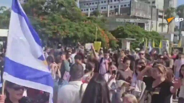 شادی و پایکوبی خانواده‌های گروگان‌های اسرائیلی پس از اعلام توافق صلح غزه - اسپوتنیک افغانستان  