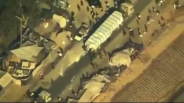 جنبش حماس ادعاهای آمریکا در مورد غارت یک کامیون کمک‌رسانی را بی‌اساس خواند - اسپوتنیک افغانستان  