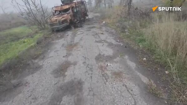 تصاویری از تجهیزات و اجساد به جا مانده ارتش اوکراین در روستای شوچنکو در نزدیکی کراسنوارمیسک - اسپوتنیک افغانستان  