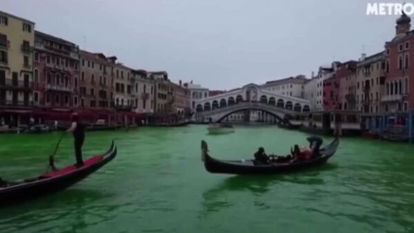 فعالان محیط‌زیست به رهبری گرتا تونبرگ آب کانال بزرگ ونیز را رنگین کردند - اسپوتنیک افغانستان  