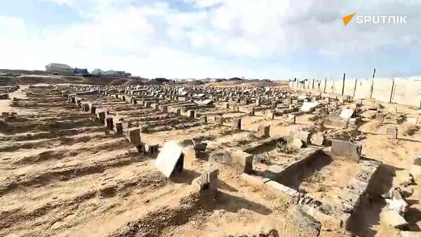 گزارش تصویری اسپوتنیک از وضعیت د شوار دفن اجساد در نوار غزه - اسپوتنیک افغانستان  