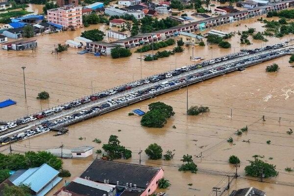 سیل شدید در جنوب تایلند خانهها را زیر آب برد سیل شدید در جنوب تایلند خانهها را زیر آب برد - اسپوتنیک افغانستان