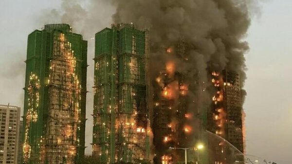 افزایش آمار قربانیان آتش‌سوزی در هنگ‌کنگ؛ تعداد کشته‌شدگان به 36 نفر رسید - اسپوتنیک افغانستان  