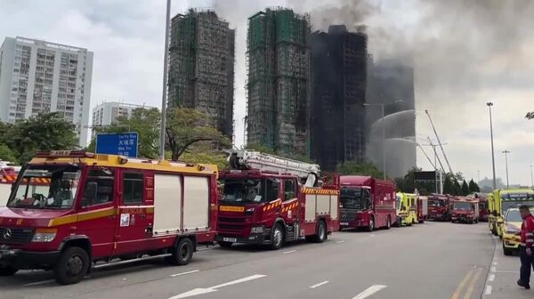 تعداد کشته‌ شدگان آتش‌سوزی در یک مجتمع مسکونی در هنگ کنگ به دها تن رسید - اسپوتنیک افغانستان  