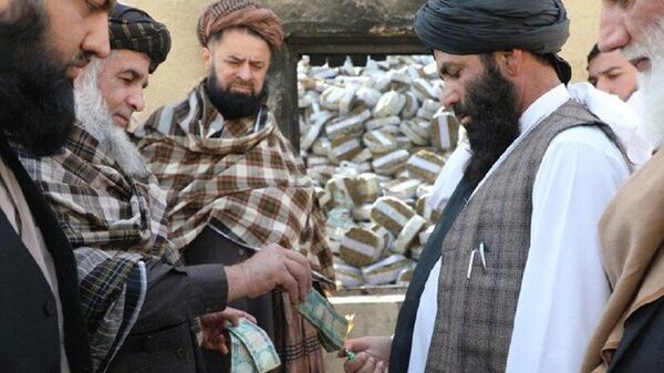 بانک مرکزی: میلیون‌ها افغانی پول مندرس در کندهار سوزانده شد - اسپوتنیک افغانستان  