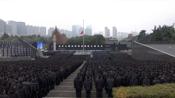 چین همزمان با افزایش تنش‌ها با جاپان یاد قربانیان قتل عام نانجینگ را گرامی داشت - اسپوتنیک افغانستان  