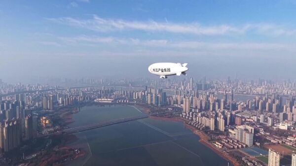 برای نخستین بار در چین، یک کشتی هوایی مسافربری به آسمان برخاست - اسپوتنیک افغانستان  