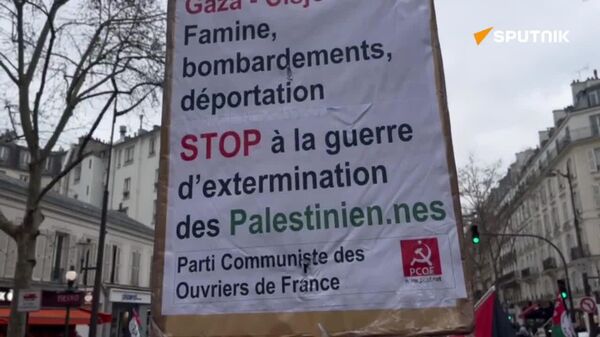 «نسل‌کشی را متوقف کنید»، «ما همه فرزندان غزه‌ایم»: راهپیمایی همبستگی با مردم فلسطین در پاریس - اسپوتنیک افغانستان  