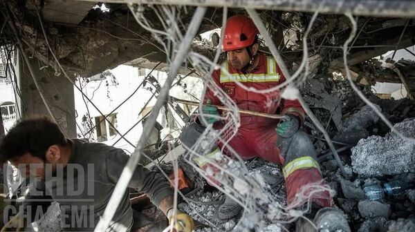 یورش هوایی اسرائیل و امریکا به منطقه سیزده آبان شهرری؛ 10 کشته از آن میان شش افغانستانی - اسپوتنیک افغانستان  