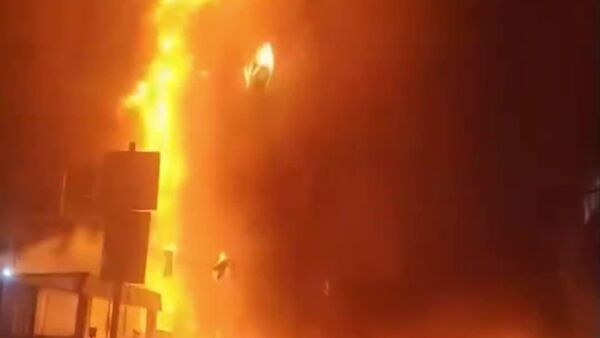 آتش سوزی در برجی در چین؛ یک کشته و ده ها زخمی - اسپوتنیک افغانستان  