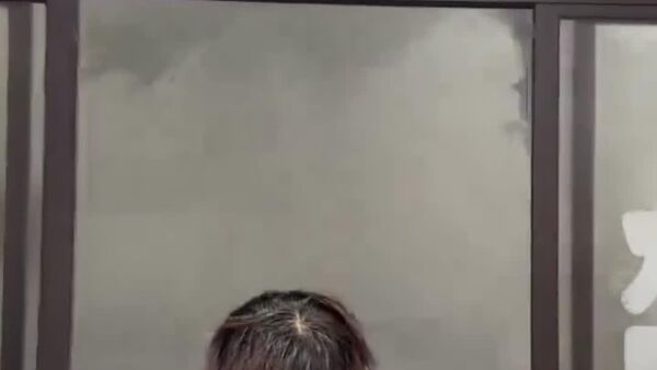 طوفان شدیدی جنوب چین را درنوردید و عابران پیاده را به خطر انداخت - اسپوتنیک افغانستان  