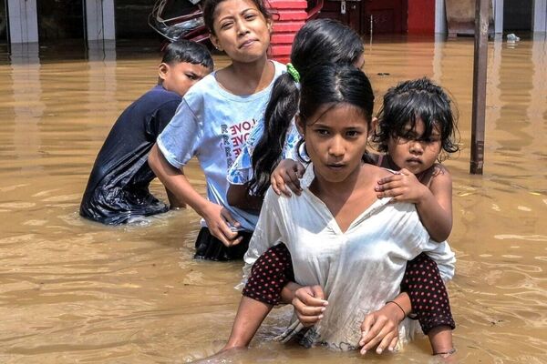جاری شدن سیلاب در هند و نپال جان بیش از 100 نفر را گرفت - اسپوتنیک افغانستان  