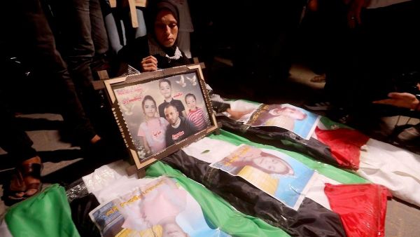 نگارههایی از مراسم خاکسپاری همگانی در غزه برای بیش از 100 فلسطینی - اسپوتنیک افغانستان  