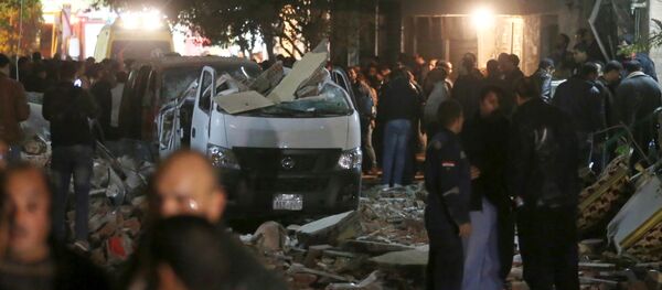 Пострадавший от взрыва автомобиль в городе Гиза, Египет Пострадавший от взрыва автомобиль в городе Гиза, Египет - اسپوتنیک افغانستان