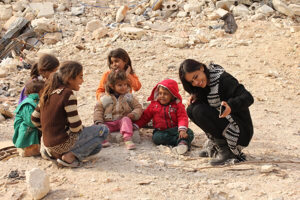 کارلا اورتیزبا بچه ها در سوریه. - اسپوتنیک افغانستان  