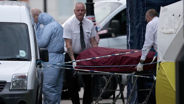 Скорая помощь с телом погибшей женщины в результате нападения в Лондоне - اسپوتنیک افغانستان  