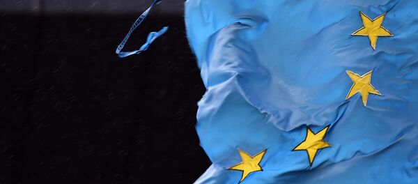 Разорваный флаг ЕС в Брюсселе Разорваный флаг ЕС в Брюсселе - اسپوتنیک افغانستان
