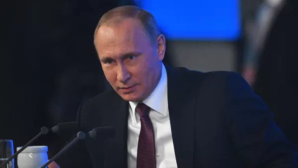 Президент РФ Владимир Путин на двенадцатой большой ежегодной пресс-конференции в Центре международной торговли на Красной Пресне - اسپوتنیک افغانستان  