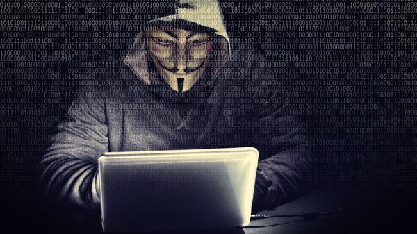 Хакер в маске Гая Фокса перед ноутбуком - اسپوتنیک افغانستان  