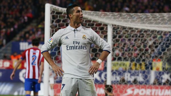 Cristiano Ronaldo comemora su gol, durante partido contra Atletico de Madrid - اسپوتنیک افغانستان  