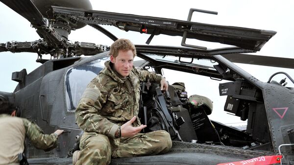 Britain's Prince Harry or just plain Captain Wales talks to a TV crew - اسپوتنیک افغانستان  