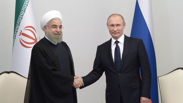 Президент Исламской Республики Иран Хасан Рухани и президент РФ Владимир Путин в Баку - اسپوتنیک افغانستان  