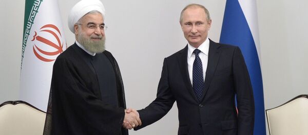 Президент Исламской Республики Иран Хасан Рухани и президент РФ Владимир Путин в Баку - اسپوتنیک افغانستان  