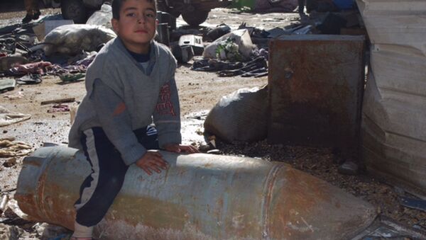 داعش پسر 11 ساله موصل-عراق رامجبور به تماشای صحنه اعدام میکرد - اسپوتنیک افغانستان  
