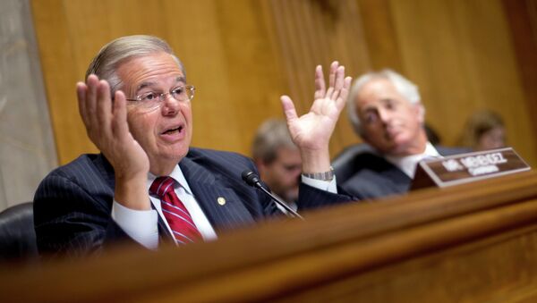 Chairman of the Senate Foreign Relations Committee, Sen. Robert Menendez, D-NJ., left, gestures as he speaks as ranking member Sen. Bob Corker, R-Tenn., sits right, during a hearing on Capitol Hill in Washington, Wednesday, July 9, 2014, to examine Russia and developments in Ukraine. - اسپوتنیک افغانستان  