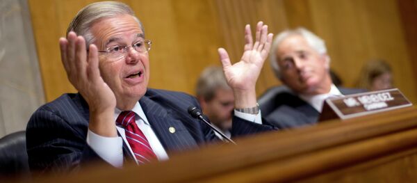 Chairman of the Senate Foreign Relations Committee, Sen. Robert Menendez, D-NJ., left, gestures as he speaks as ranking member Sen. Bob Corker, R-Tenn., sits right, during a hearing on Capitol Hill in Washington, Wednesday, July 9, 2014, to examine Russia and developments in Ukraine. Chairman of the Senate Foreign Relations Committee, Sen. Robert Menendez, D-NJ., left, gestures as he speaks as ranking member Sen. Bob Corker, R-Tenn., sits right, during a hearing on Capitol Hill in Washington, Wednesday, July 9, 2014, to examine Russia and developments in Ukraine. - اسپوتنیک افغانستان