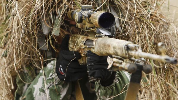 Снайпер на позиции во время учений бригады специального назначения ЮВО в Краснодарском крае - اسپوتنیک افغانستان  
