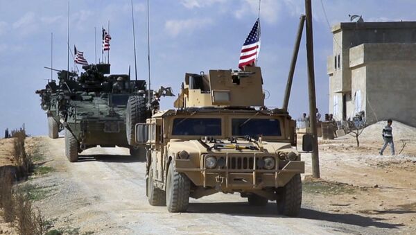 This Tuesday, March 7, 2017 frame grab from video provided by Arab 24 network, shows U.S. forces patrol on the outskirts of the Syrian town, Manbij, a flashpoint between Turkish troops and allied Syrian fighters and U.S.-backed Kurdish fighters, in al-Asaliyah village, Aleppo province, Syria - اسپوتنیک افغانستان  