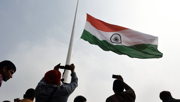Indian residents photograph India's tallest flag as it is unveiled in Faridabad on the outskirts of New Delhi on March 3, 2015 - اسپوتنیک افغانستان  