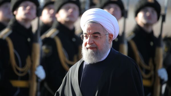 Президент Исламской Республики Иран Хасан Рухани во время церемонии встречи в аэропорту Внуково-2 - اسپوتنیک افغانستان  
