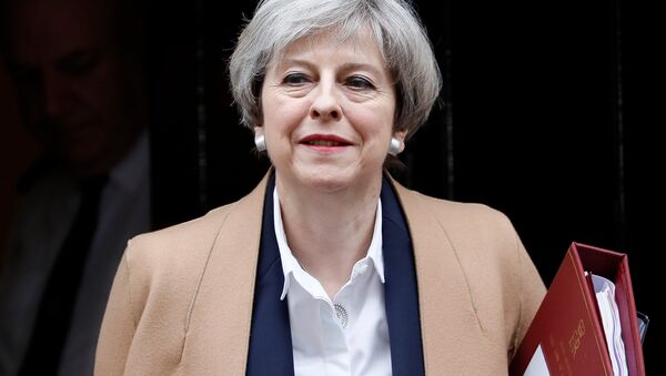 Britain's Prime Minister Theresa May leaves 10 Downing Street in London, March 29, 2017. - اسپوتنیک افغانستان  