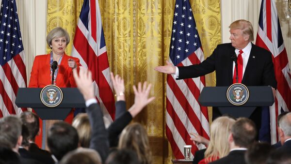 President Donald Trump and British Prime Minister Theresa May during their joint news conference in the East Room of the White House White House in Washington, Friday, Jan. 27, 2017. - اسپوتنیک افغانستان  