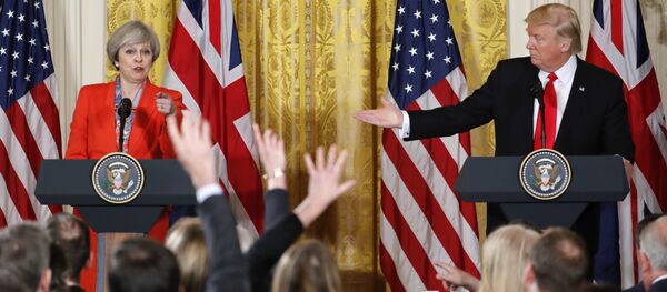 President Donald Trump and British Prime Minister Theresa May during their joint news conference in the East Room of the White House White House in Washington, Friday, Jan. 27, 2017. - اسپوتنیک افغانستان  