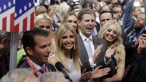 Republican Presidential Candidate Donald Trump's children Donald Trump, Jr., Ivanka Trump, Eric Trump and Tiffany Trump celebrate on the convention floor during the second day session of the Republican National Convention in Cleveland, Tuesday, July 19, 2016. - اسپوتنیک افغانستان  