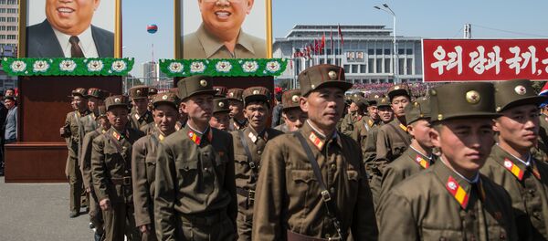 Portraits of Kim Il-sung and Kim Jong-il at a ceremony to open a new residential area on Ryomyong Street in Pyongyang. Portraits of Kim Il-sung and Kim Jong-il at a ceremony to open a new residential area on Ryomyong Street in Pyongyang. - اسپوتنیک افغانستان