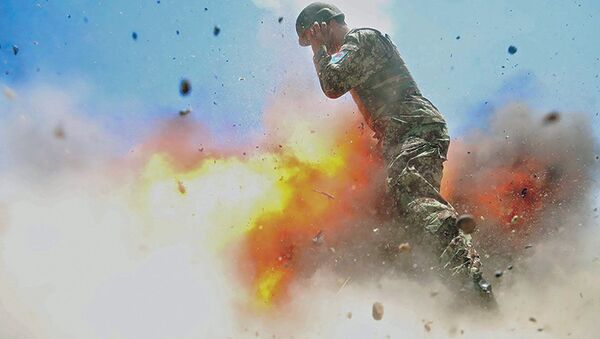 عکاس نظامی امریکایی در افغانستان یک لحظه پیش از مرگش انفجار را عکسبرداری کرد + عکس - اسپوتنیک افغانستان  