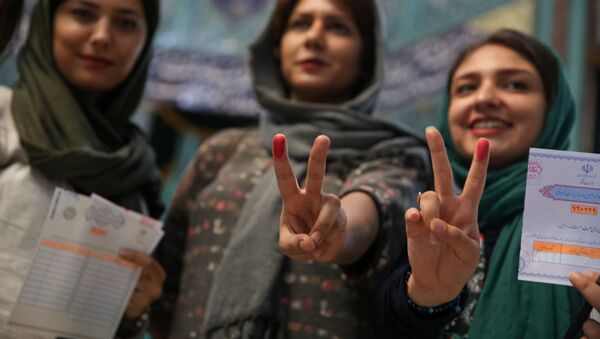 مردم ایران به شکل گسترده ای در انتخابات ریاست جمهوری شرکت کردند - اسپوتنیک افغانستان  